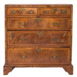 An early 18th Century walnut, crossbanded and feather strung rectangular chest:,