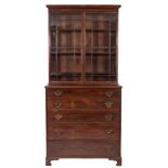A George III mahogany secretaire chest with associated bookcase:,