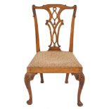 An 18th Century carved walnut dining chair in the Chippendale taste:,
