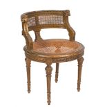 A French carved giltwood occasional chair:, of tub-shaped outline,