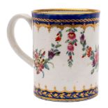 A First Period Worcester cylindrical mug: with grooved strap handle,