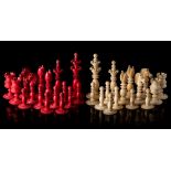 A matched ivory Calvert pattern chess set:, natural and stained red, the king 10cm.
