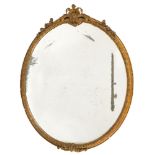 A Victorian giltwood and gesso oval mirror:, with palmette, acanthus scroll and flowerhead cresting,