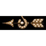 A Victorian seed pearl mounted bar brooch: in the form of an arrow with horseshoe with attached
