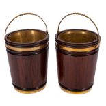 A pair of mahogany and brass bound buckets in the 18th Century style:,