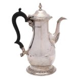 A Victorian silver coffee pot, maker Charles Stuart Harris, London, 1898: of baluster form,