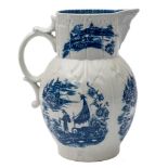 A Caughly blue and white cabbage leaf jug: with mask head spout and double scroll handle,