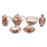A First Period Worcester 'Scarlet Japan' pattern part service: of fluted form,
