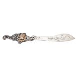 A sterling silver and gilt decorated Art Nouveau period paper knife,