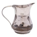 A Middle Eastern silver and niello cream jug: of baluster form,