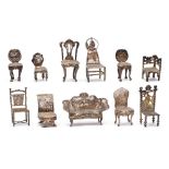 A collection of Dutch silver miniature furniture,