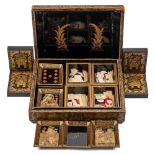 A Cantonese export gilt lacquer games box: the lift-off lid enclosing four lidded boxes and eight