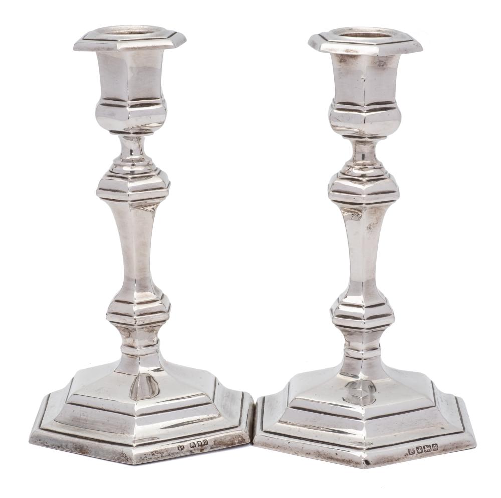 A matched pair of silver candlesticks, maker Thomas Bradbury & Sons Ltd, Sheffield, 1918 and London,