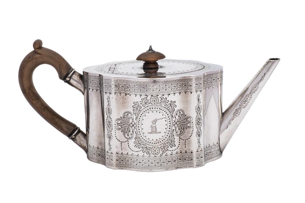 A Victorian silver teapot, maker Charles Stuart Harris, London, 1876: crested,