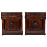 A pair of 19th Century French rosewood veneer pier cabinets:, each surmounted by a white marble top,
