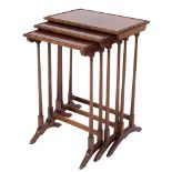 A nest of three mahogany occasional tables in the Regency taste:,