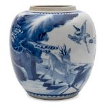 A Chinese porcelain oviform jar: painted in blue with a pair of deer and two cranes in a