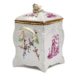 A Berlin KPM porcelain two-handled box and cover: of square section with branch handles and flower