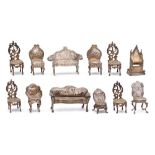 A collection of English and Dutch silver miniature furniture,