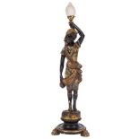 A 19th Century carved and decorated Blackamoor figure:, the standing male in Moorish attire,