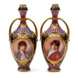 A pair of Austrian 'Vienna' porcelain two-handled vases: of ovoid form with waisted necks,