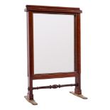 An Edwardian mahogany firescreen in the manner of Gillows:,