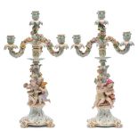 A pair of late 19th century Meissen porcelain four-light figural candelabra: representing the four