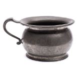 A late 18th/early 19th Century pewter chamber pot: of traditional design with loop carrying handle