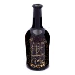 A free blown cylinder wine bottle: of dark olive colour with pronounced 'kick up' raised neck and