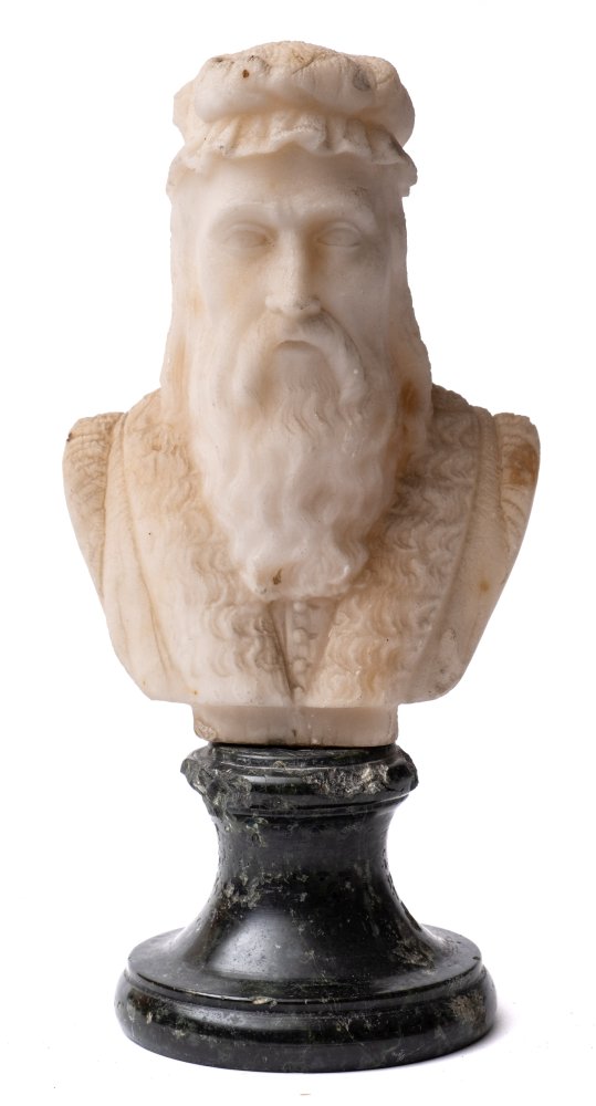 A carved white marble bust of Cellini: unsigned, on black marble socle, overall height 23cm.