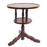 A rare late 17th Century oak two tier circular revolving occasional table:,