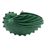 A 19th Century green-glazed nautilus shell wall pocket: impressed upper case 'G', probably Wedgwood,