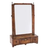 An early 18th Century walnut swing frame platform toilet mirror:,