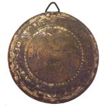 A 17th Century brass warming pan lid: depicting a leopard passant and 'Put your trust in God', 27.