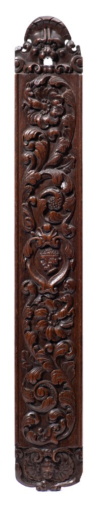 A late 17th Century Friesian carved oak mangle board: of arched form,