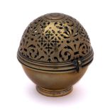 An early 18th Century brass sponge box: of spherical form, with pierced hinged lid,