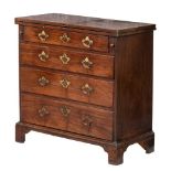 A George II mahogany bachelor's chest:, with a rectangular hinged top,
