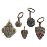 A late Medieval horse harness pendant: of shield-shaped outline decorated with red chevrons,