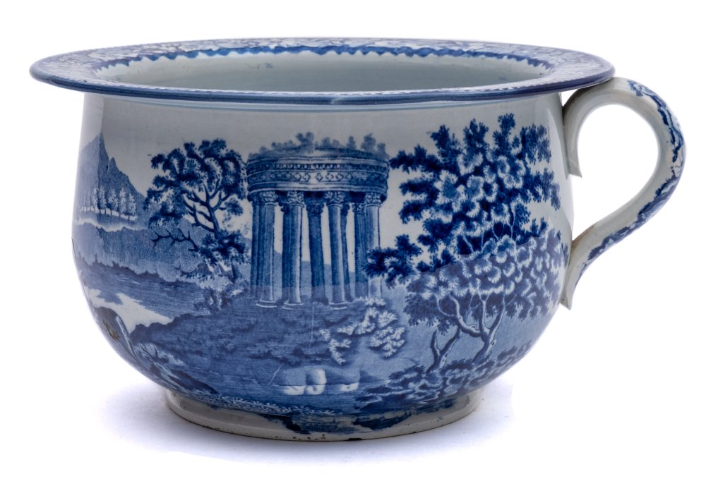 An early 19th Century blue and white pearlware chamber pot: in a 'Passion Flower Border Series'