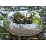 A small granite trough: of oblong shape, 31cm (12 1/4in) x 25cm (9 3/4in).