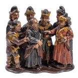 A 16th Century oak and polychrome carved group,