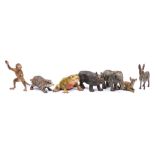 A group of six Austrian cold painted bronze animals: comprising an elephant, rhinoceros, badger,