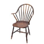 An early 19th Century Yealmpton Windsor elbow chair: in ash and elm,