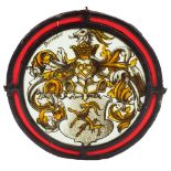 A 19th Century stained glass armorial roundel: entitled 'December',