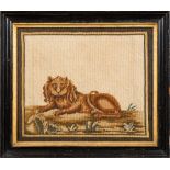 A pair of 19th Century naive woolwork pictures of a lion and tiger: the lion lying on a grassy bank,