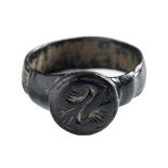 A bronze seal ring: ascribed Romano/British c.A.D 400.