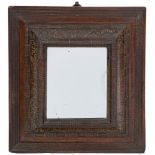 A 17th Century fruitwood and gilt decorated ripple moulded mirror:,