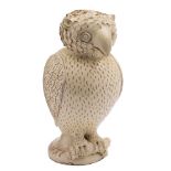 A Skotterup (Danish) pottery money box in the form of an owl: decorated in cream slip,