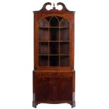 A George III mahogany and inlaid standing corner display cabinet: crossbanded in kingwood,