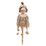 A late 19th/early 20th Century German bisque head musical spinning doll: impressed 3200,